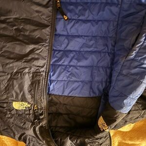 The North Face Black and Blue Puffer Jacket